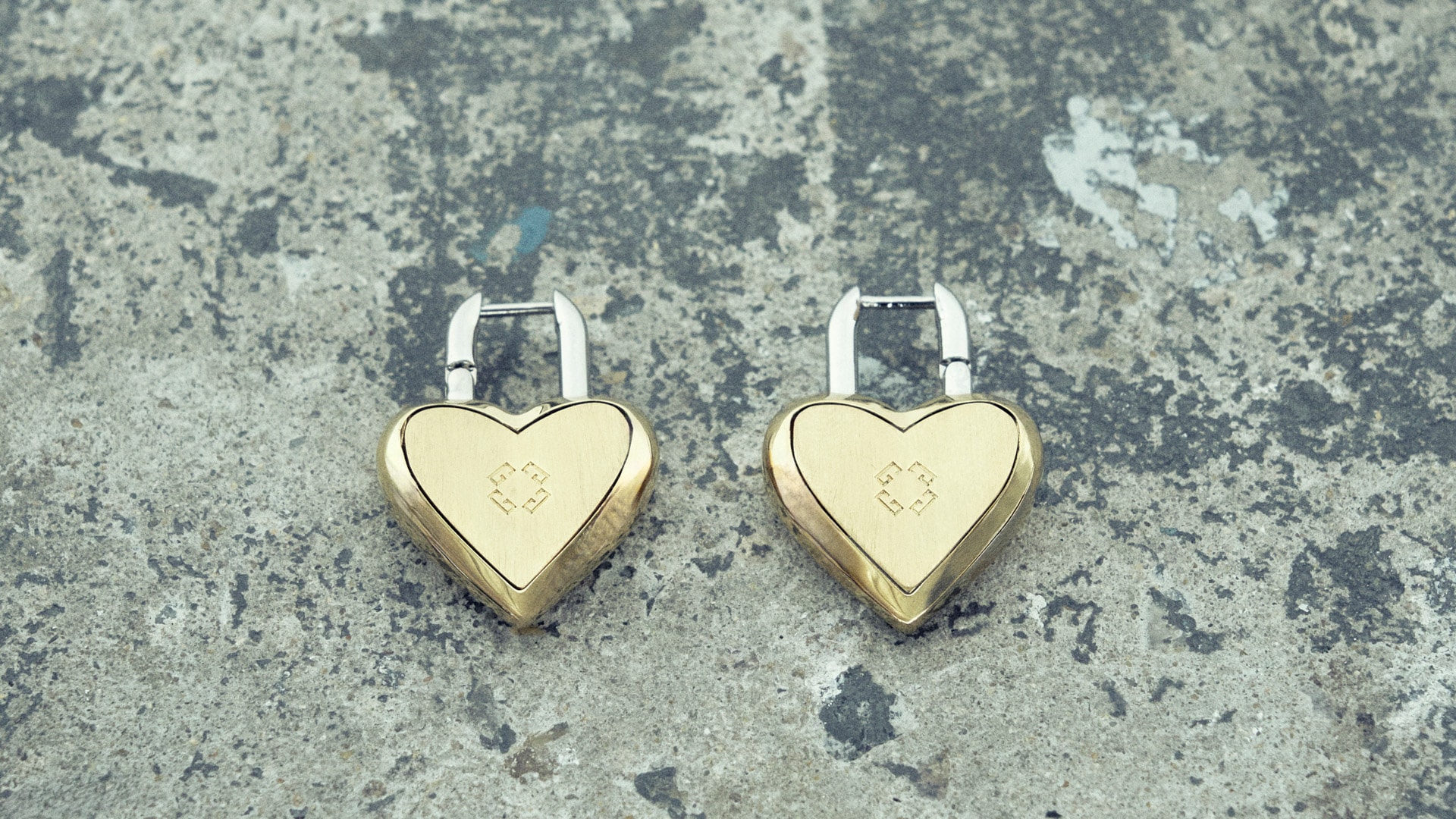 Heart Lock earrings in metal
